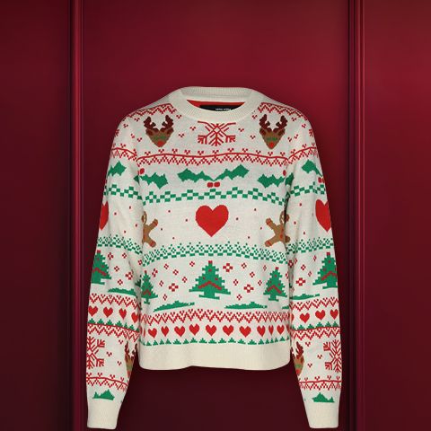 Un jersey navideño festivo con un motivo de reno, una nariz de pompón roja y una bufanda con estampado rojo y blanco sobre un fondo rojo oscuro. En la parte superior se puede ver el texto "NAVIDAD FEA".